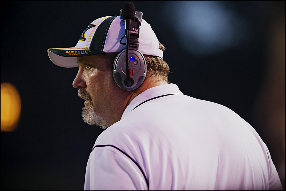  St. Xavier coach Will Wolford watches his team from the sideline during the Tigers game against Bowling Green at Bowling Green High School on Friday, September 5, 2014. The Tigers would go on to loose 6-0 in overtime. Photos by Brian Powers 