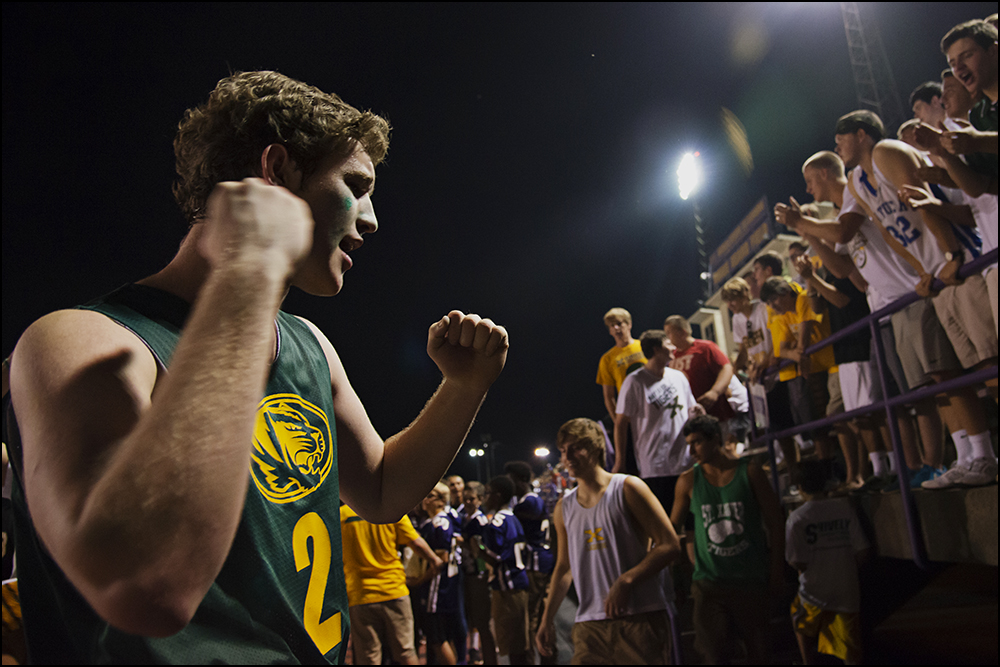  St. Xavier senior Connor Crush, from Louisville, cheers with the rest of the St. Xavier student section during the Tigers game against Bowling Green at Bowling Green High School on Friday, September 5, 2014. The Tigers would go on to loose 6-0 in ov