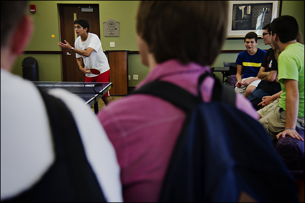  Gatton Academy students watch as Nitin Krishna, top left, from Knox County, Ky. serves during a game of ping-pong with Harsh Moolani, a junior from Davis County, not pictured, at the Academy on the campus of Western Kentucky University in Bowling Gr