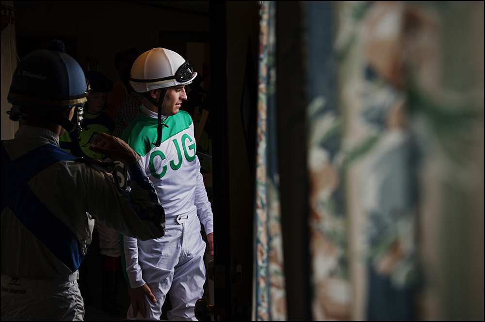  Chris Landeros, 26, center, from California, heads out to the track for his fourth and final race of the day at Kentucky Downs race track in Franklin, Ky. on Wednesday, September 10, 2014. By Brian Powers, Special to the CJ, 09/08/2014 