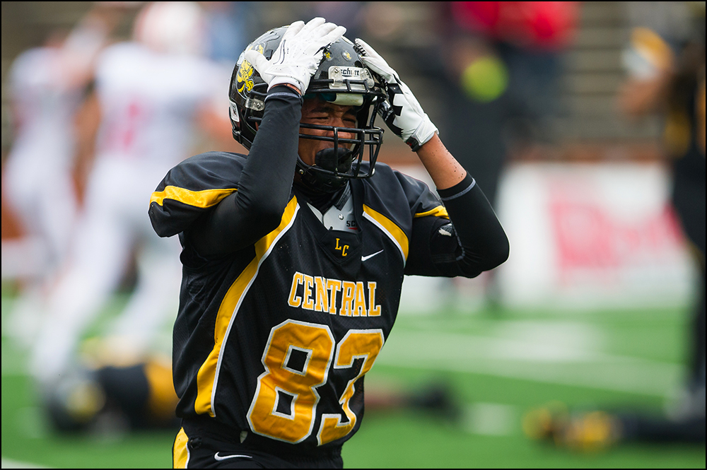  Central High School's Raiden Anderson reacts after Central lost 7-14 to Belfry during the KHSAA Commonwealth Gridiron Bowl at Western Kentucky University on Friday, December 5, 2014. Photo by Brian Powers 