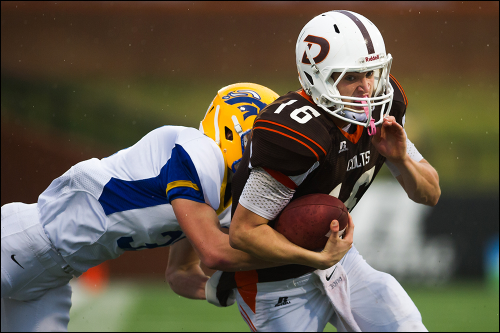  Desales Austin Johnson rushes to the end zone during the first half of their 2A championship game against Newport Central Catholic at the KHSAA Commonwealth Gridiron Bowl at Western Kentucky University on Friday, December 5, 2014. Photo by Brian Pow