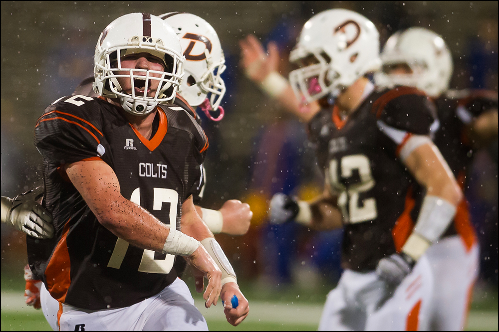  Desales's Adam Nord celebrates as time winds down during their game against Newport Central Catholic the KHSAA Commonwealth Gridiron Bowl at Western Kentucky University on Friday, December 5, 2014. Desale would go on to win 26-0. Photo by Brian Powe