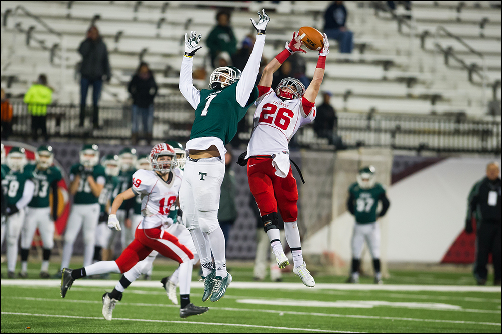  Trinity's Canon Jackson can not block a pass to Dixie Heights's Ethan Harrison at the end of the second quarter during their KHSAA Commonwealth Gridiron Bowl game at Western Kentucky University in Bowling Green, KY on Saturday, December 6, 2014. Tri