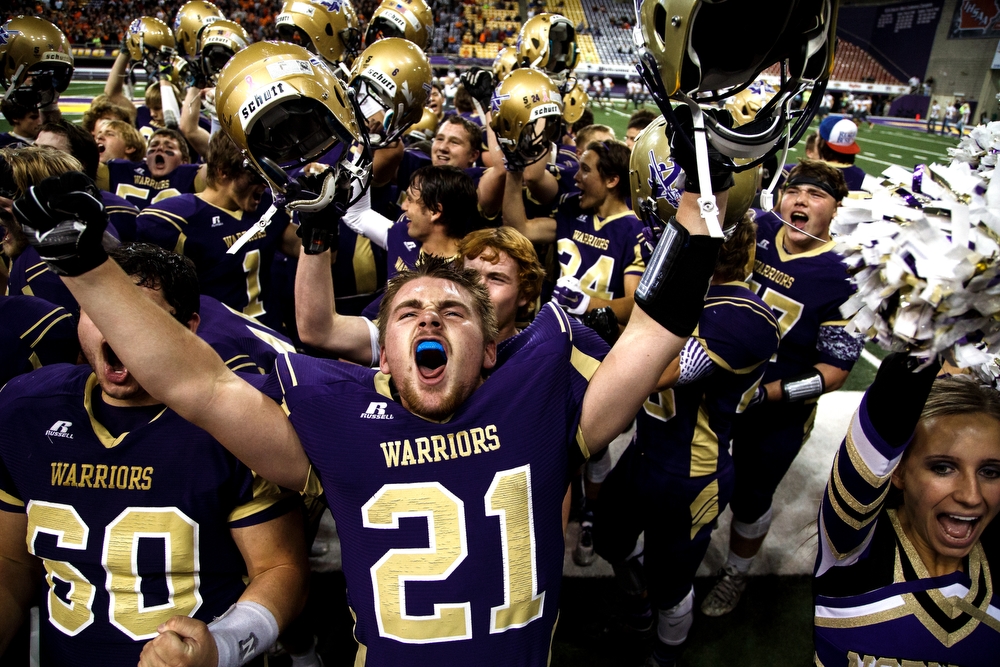  Norwalk's Zachary Cook celebrates with his team after they defeated Sergeant Bluff-Luton during their semifinal game at the UNI dome on Thursday, November 12, 2015 in Cedar Falls.
 