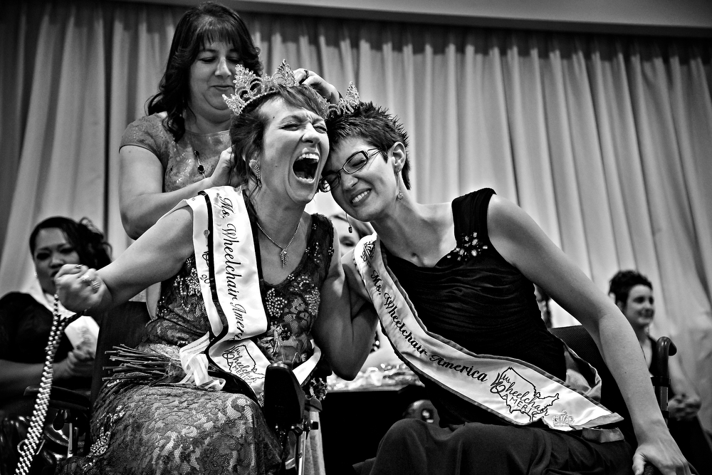  The new Ms. Wheelchair America, Dr. Alette Coble-Temple, left of California, celebrates with the outgoing Ms. Wheelchair America Samantha Schroth after Coble-Temple was named 2016 Ms. Wheelchair America at the Marriott in Downtown Des Moines on Satu