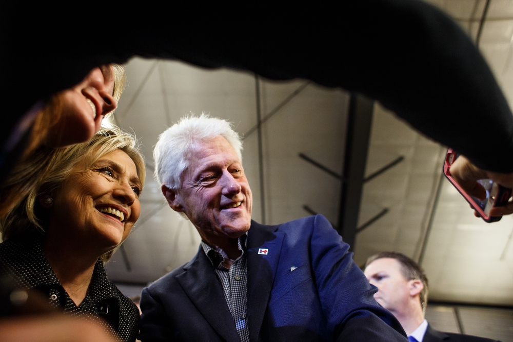  Hillary Clinton and her husband Bill take a selfie with a supporter after speaking at the Central Iowa Democrats Fall Barbecue inside the Hansen Agriculture Student Learning Center on Sunday, November 15, 2015 in Ames.
 