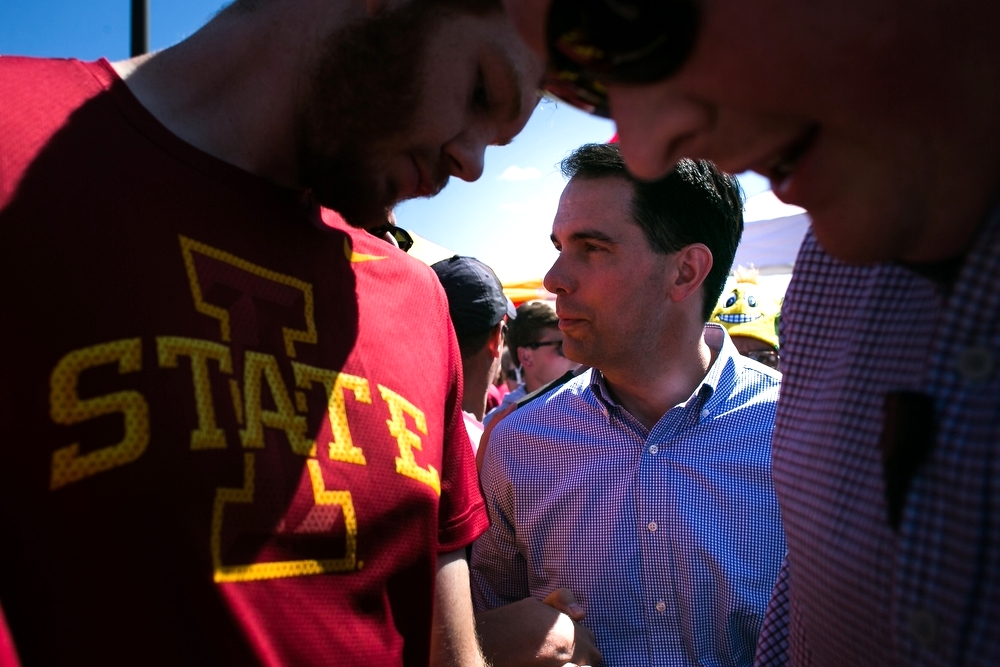  Republican Presidential candidate Scott Walker campaigning during the tailgate before the Cy-Hawk game at Iowa State University in Ames on Saturday, September 12, 2015.  
