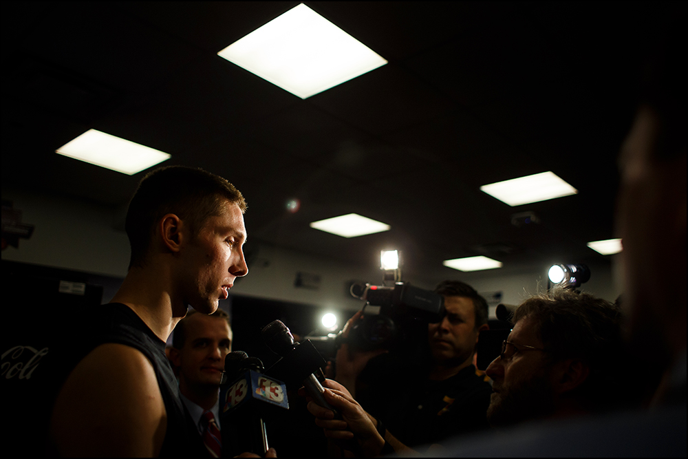  Iowa’s Jarrod Uthoff (20) answers questions from the media in the team's locker room before taking the court for practice on Thursday, March 17, 2016 in New York City, New York. 