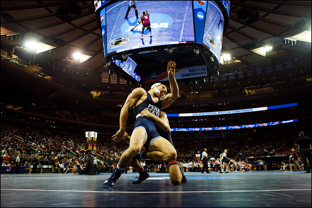  Penn State's Geno Morelli falls back on Illinois Steven Rodrigues during their second round NCAA Division I championship bout on Thursday, March 17, 2016 in New York City, New York. 