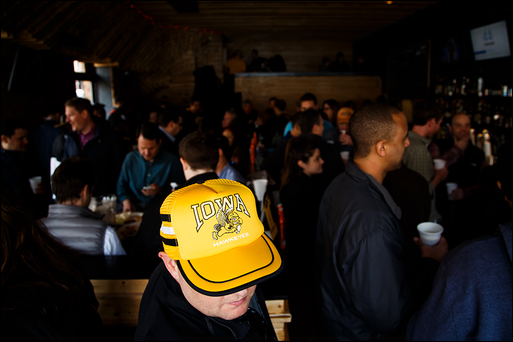  Iowa fans gather at The Montrose Bar in Brooklyn before the Hawkeyes take on Temple for their first round NCAA championship game on Friday, March 18, 2016. 