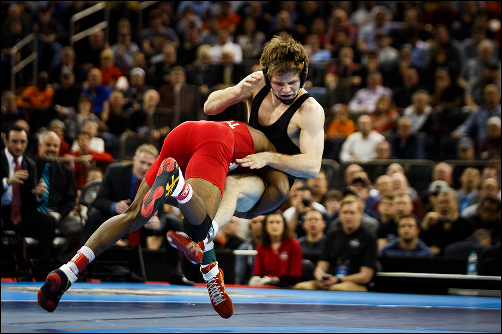  Iowa’s Cory Clark wrestles Cornell's Nahshon Garrett during their NCAA championship bout on Saturday, March 19, 2016 in New York City, New York. Garrett would go on to win 7-6. 