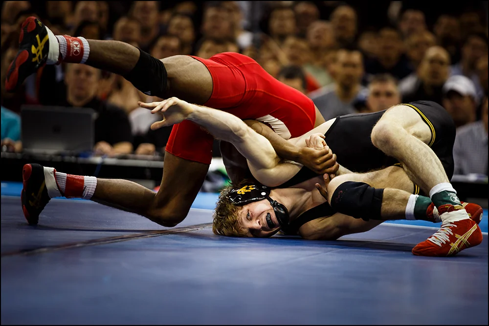 Iowa’s Cory Clark wrestles Cornell's Nahshon Garrett during their NCAA championship bout on Saturday, March 19, 2016 in New York City, New York. Garrett would go on to win 7-6.