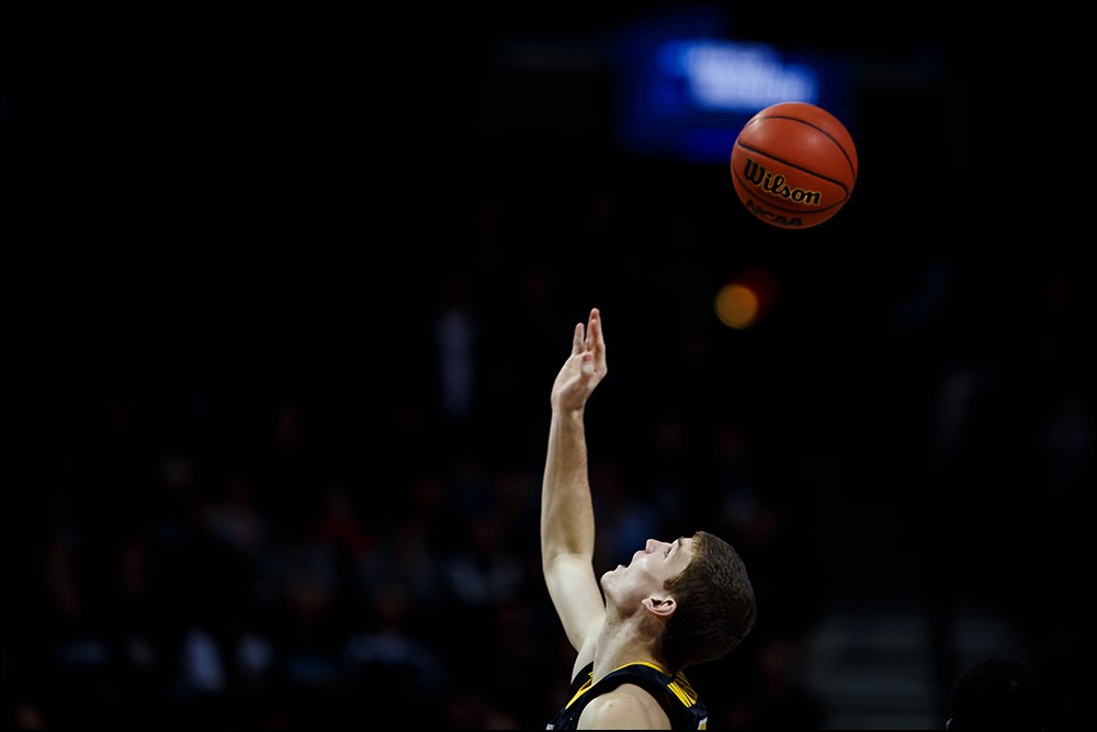  Iowa’s Adam Woodbury (34) looks up at the ball at tipoff during their second round NCAA Basketball Championship game against Villanova on Sunday, March 20, 2016 in New York City, New York. 