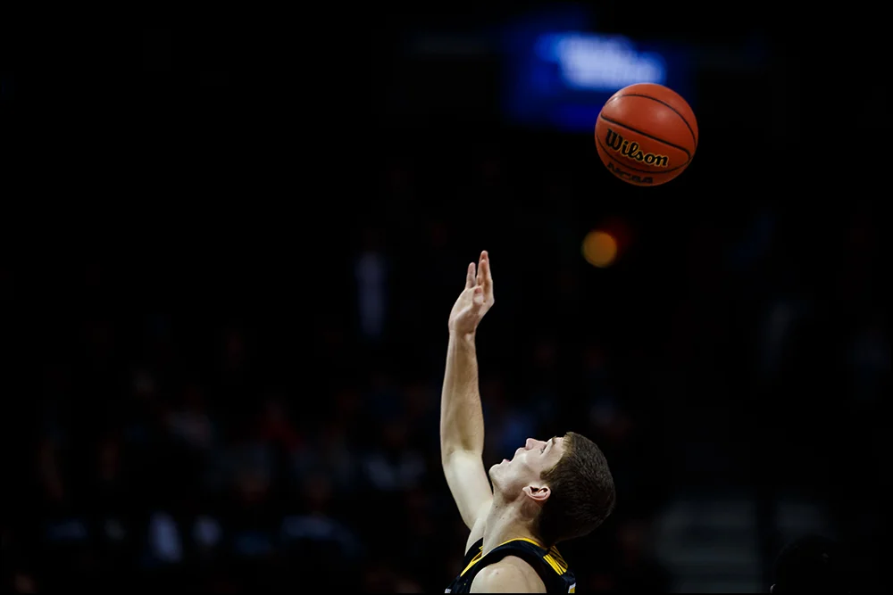 Iowa’s Adam Woodbury (34) looks up at the ball at tipoff during their second round NCAA Basketball Championship game against Villanova on Sunday, March 20, 2016 in New York City, New York.