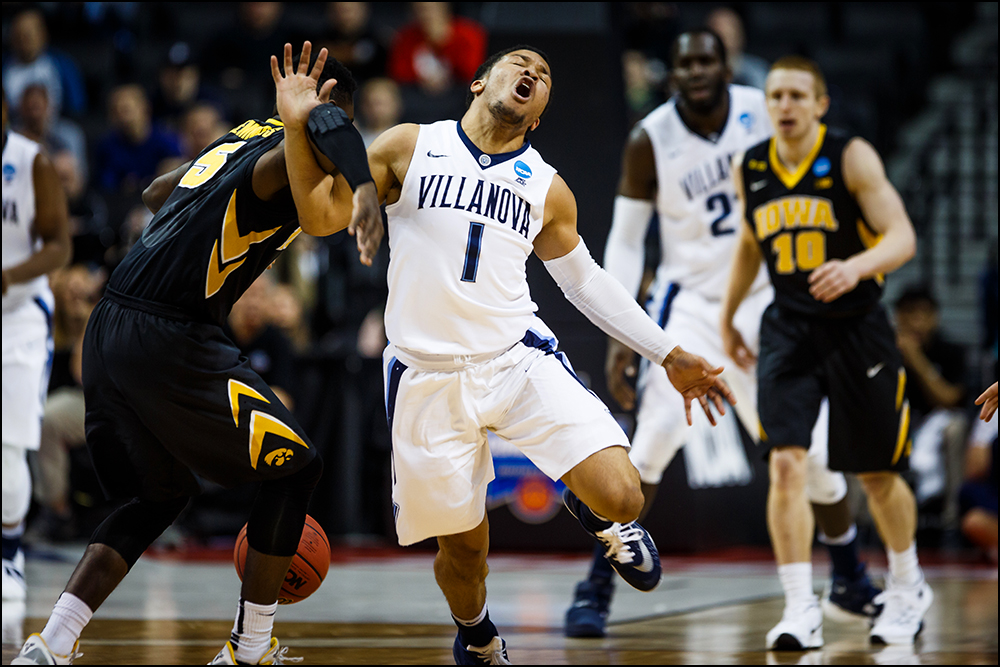  Iowa’s Anthony Clemmons (5) fouls Villanova's Jalen Brunson during their second round NCAA Basketball Championship game on Sunday, March 20, 2016 in New York City, New York. 