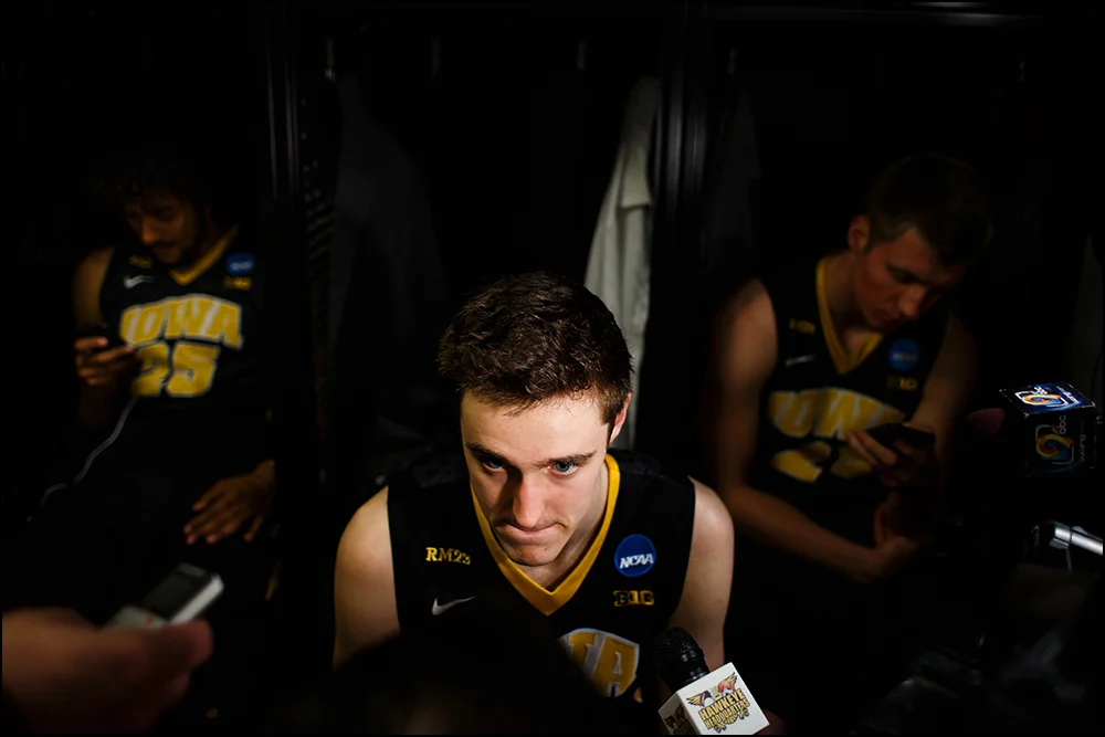 Iowa’s Nicholas Baer (51) talks to the media in the locker room following their 87-68 loss to Villanova during their second round NCAA Basketball Championship game on Sunday, March 20, 2016 in New York City, New York.