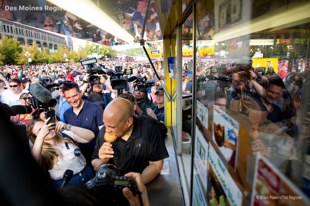  New Jersey Senator and 2020 Democratic presidential candidate Cory Booker tries a fried peanut butter and jelly sandwich during the Iowa State Fair on Saturday, Aug. 10, 2019 in Des Moines.  