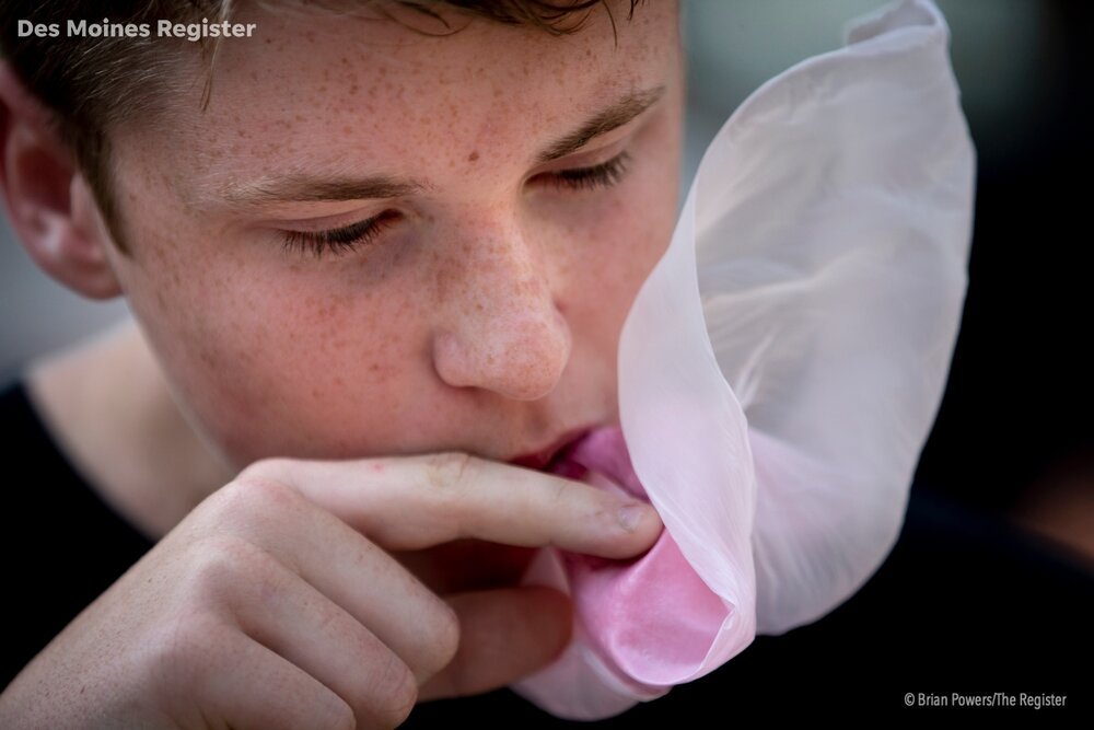  Aiden Thompson, 14 of Nevada, blows a bubble during the Bubble blowing contest at Iowa State Fair on Thursday, Aug. 15, 2019 in Des Moines.  