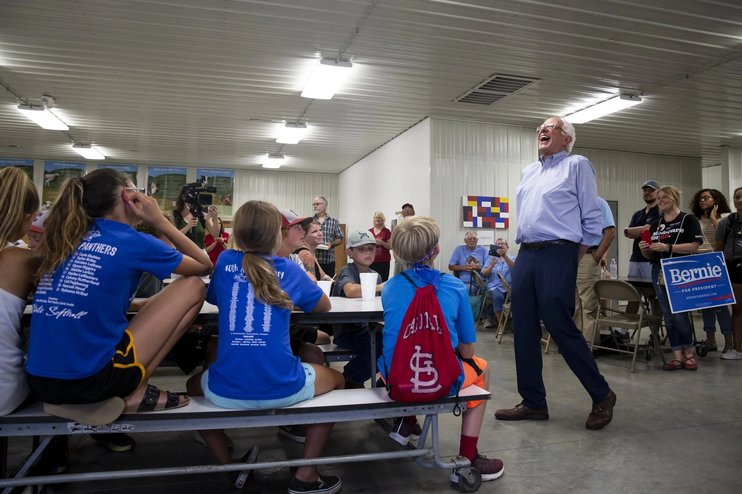  Vermont Senator and 2020 Democratic presidential candidate Bernie Sanders laughs at a response as he talks to kids at the Union County Democrats booth during the Union County fair on Saturday, July 20, 2019, in Afton.  