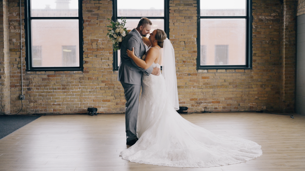 Bride and groom portrait wide shot.png