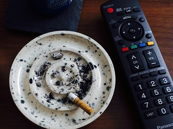 always ashy ash tray it's always clean, its always dirty. cast stoneware with underglaze. 