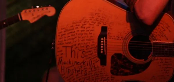 Sometimes I forget my guitar was completely covered by writing at one point. Good times. Maybe I’ll bring that back. Or maybe I find someone who is actually talented who can draw some wild images on my guitar. Any takers?
Well, actually, the r…