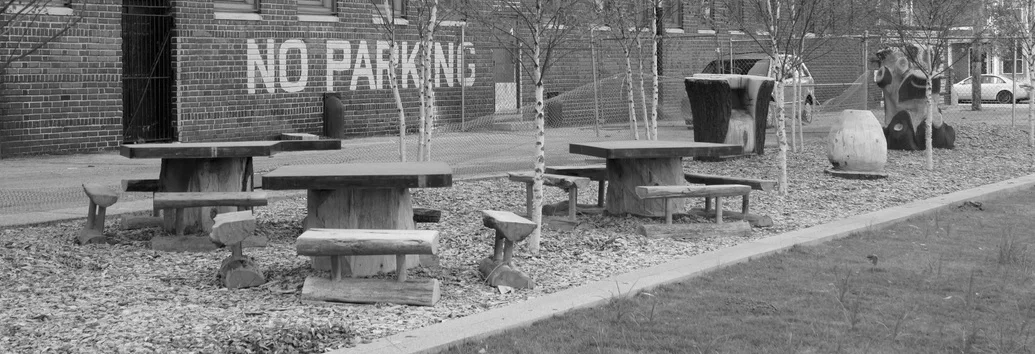 patrick henry school tables, play sculptures_concrete, steel, salvaged logs