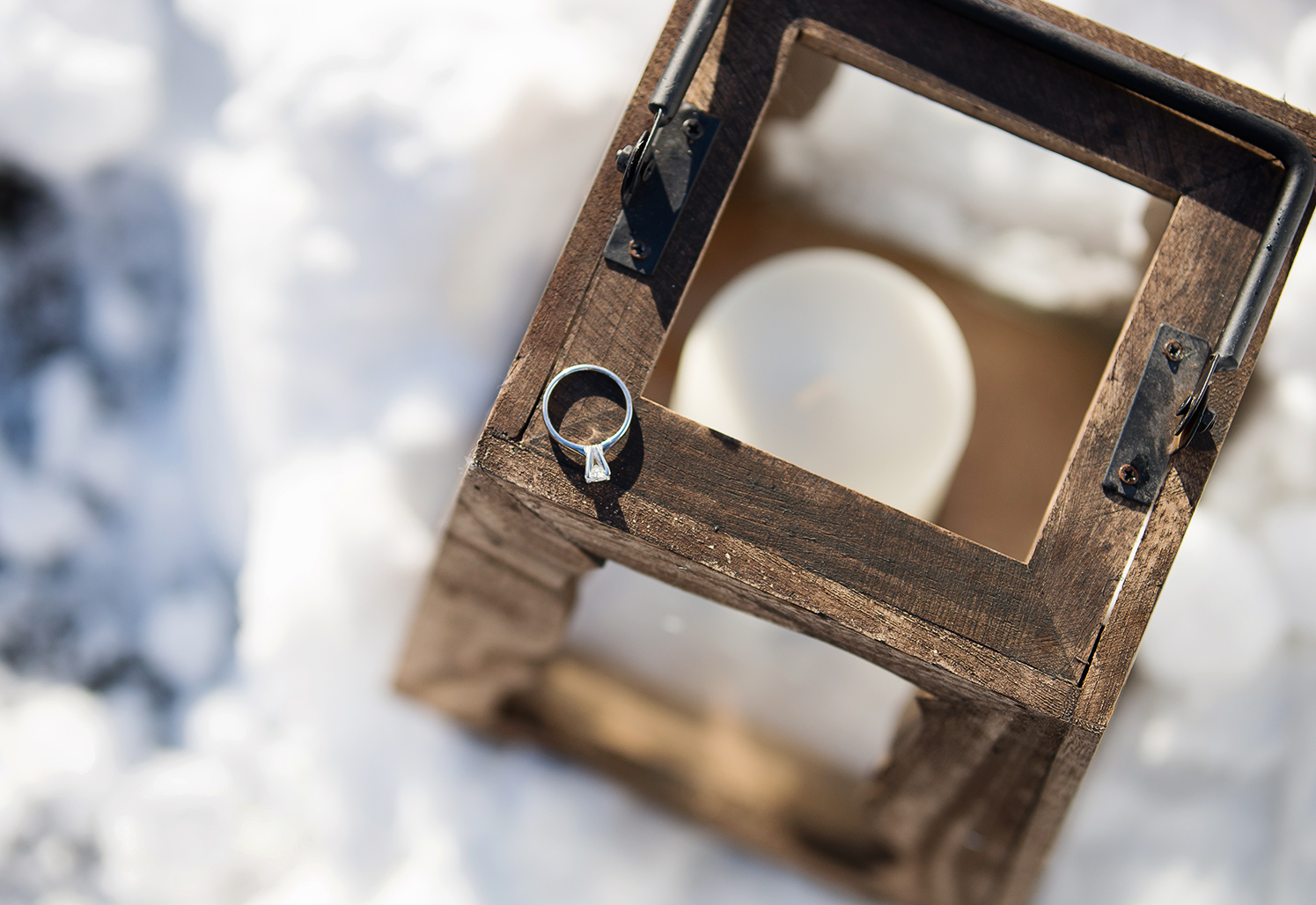 Engagement ring in snow at woodlawn manor