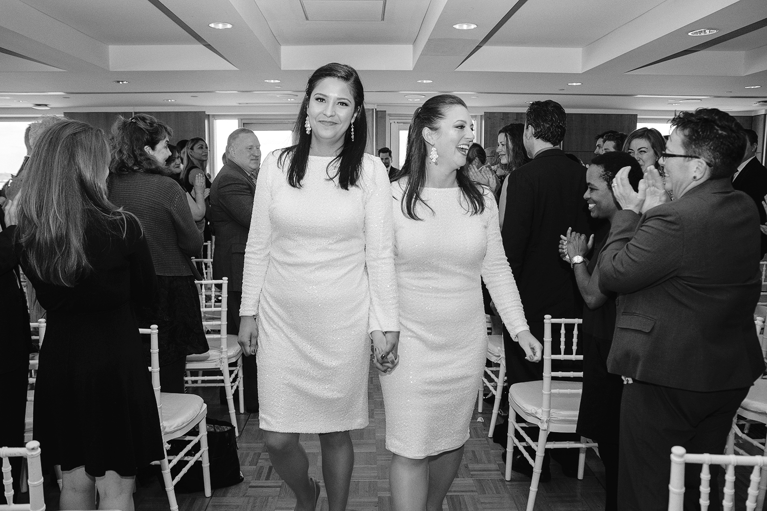 Brides walking down the aisle after wedding ceremony at DC rooftop wedding venue 