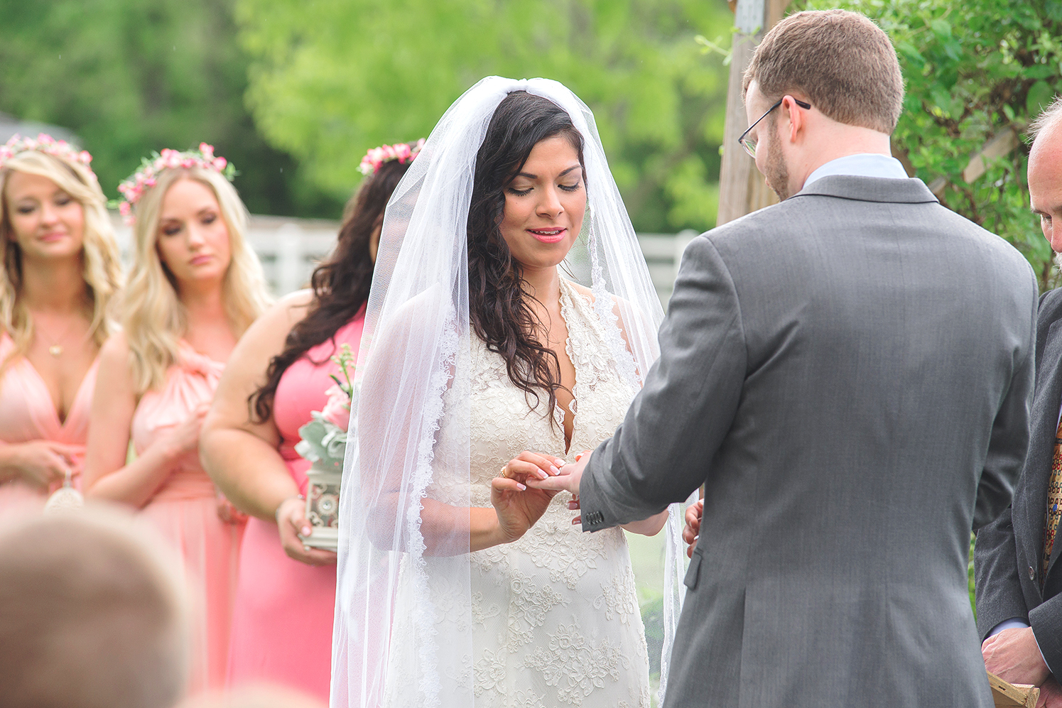 Rings and vows during wedding ceremony at Rosedale Manor at Greenwell State Park 