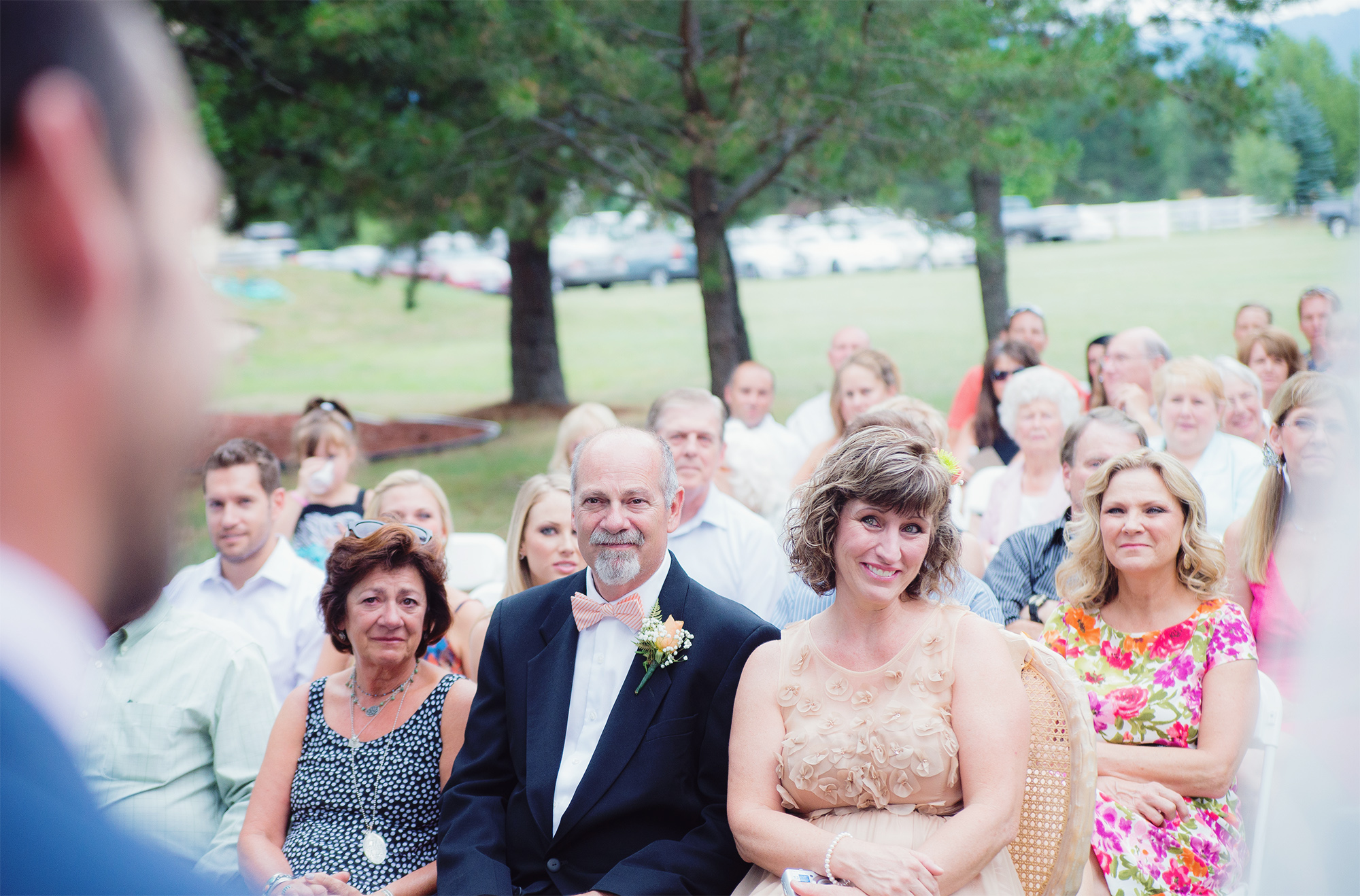 Emotional parents watching wedding ceremony in Idaho