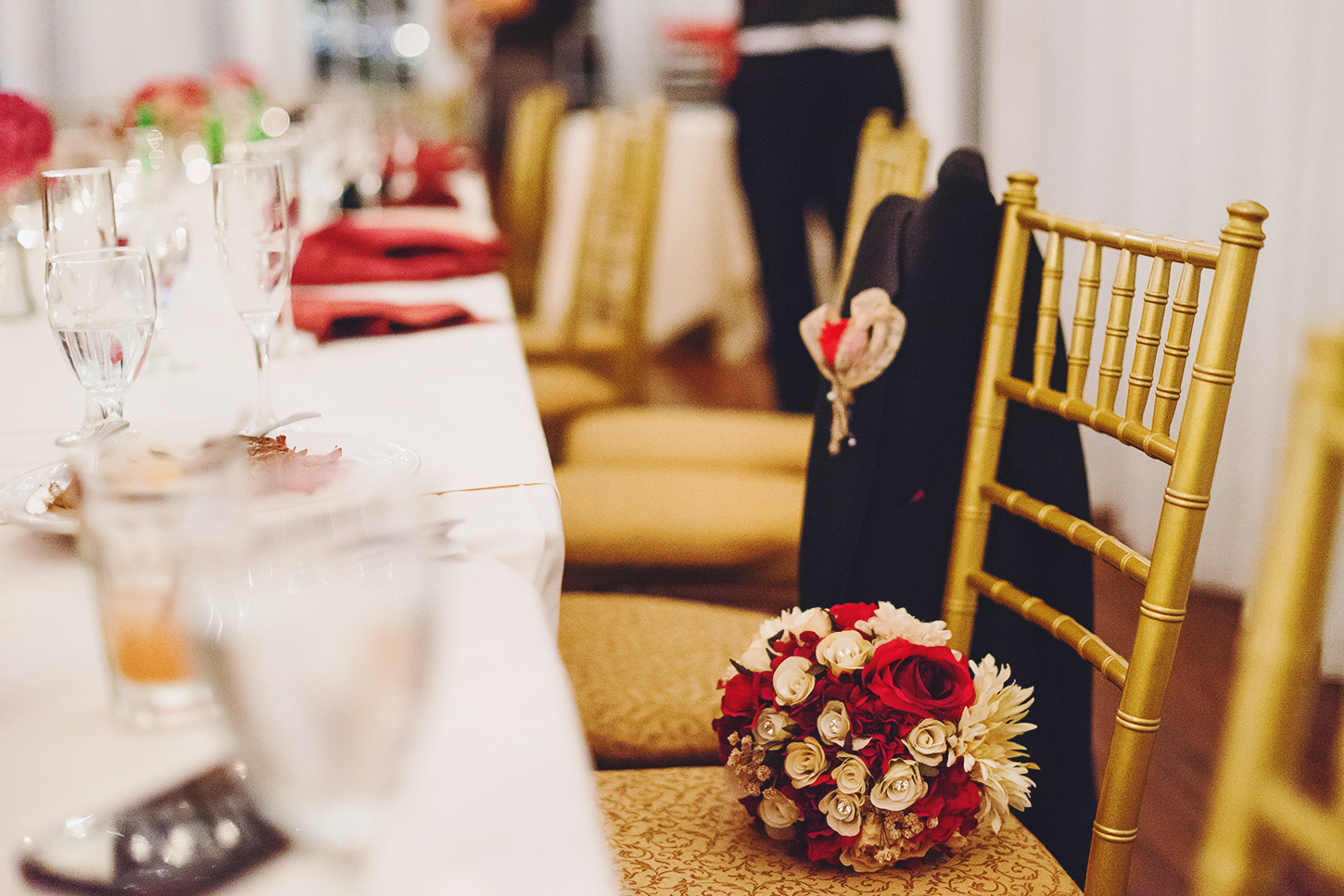 Table decor and rose bouquet at Bristow Manor wedding