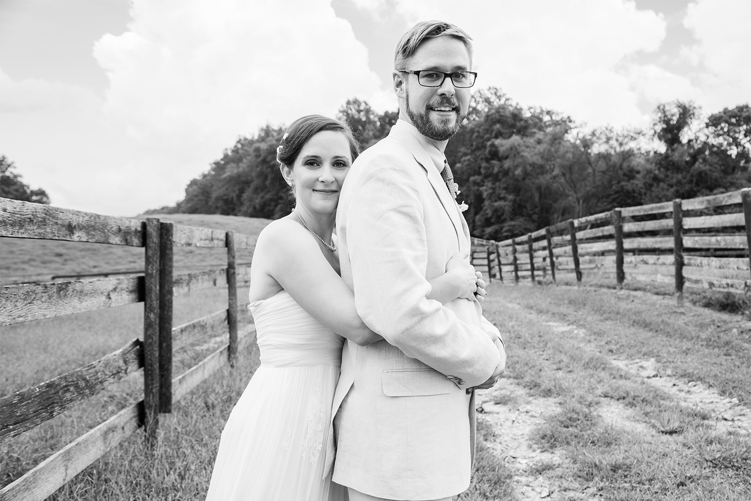 Bride and groom at horse farm barn wedding in baltimore maryland