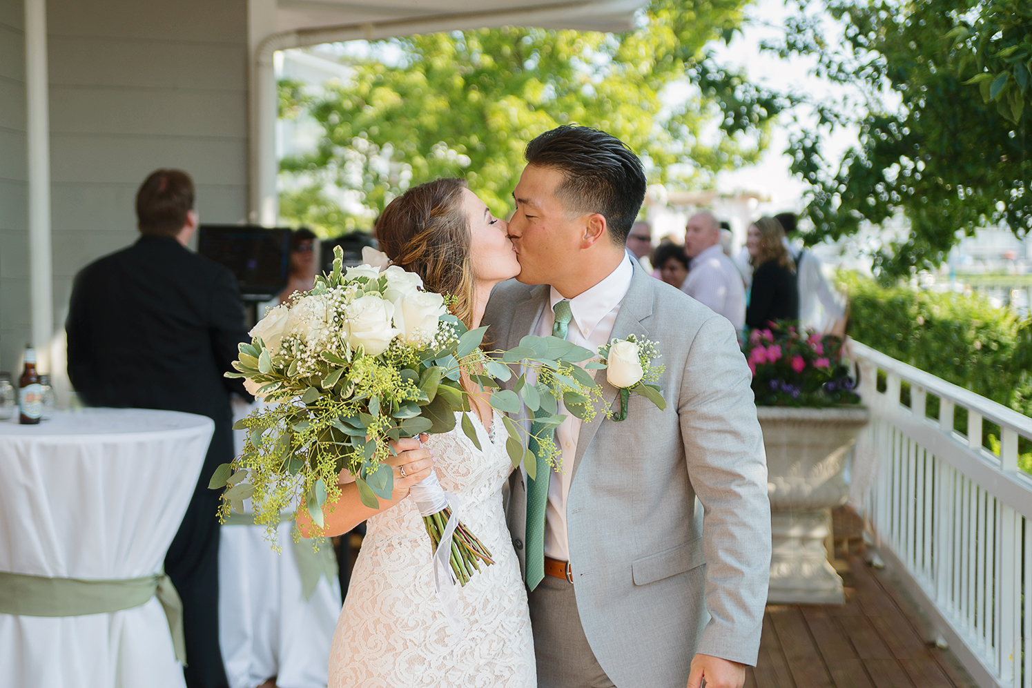 Bride and groom kiss after the wedding ceremony in annapolis