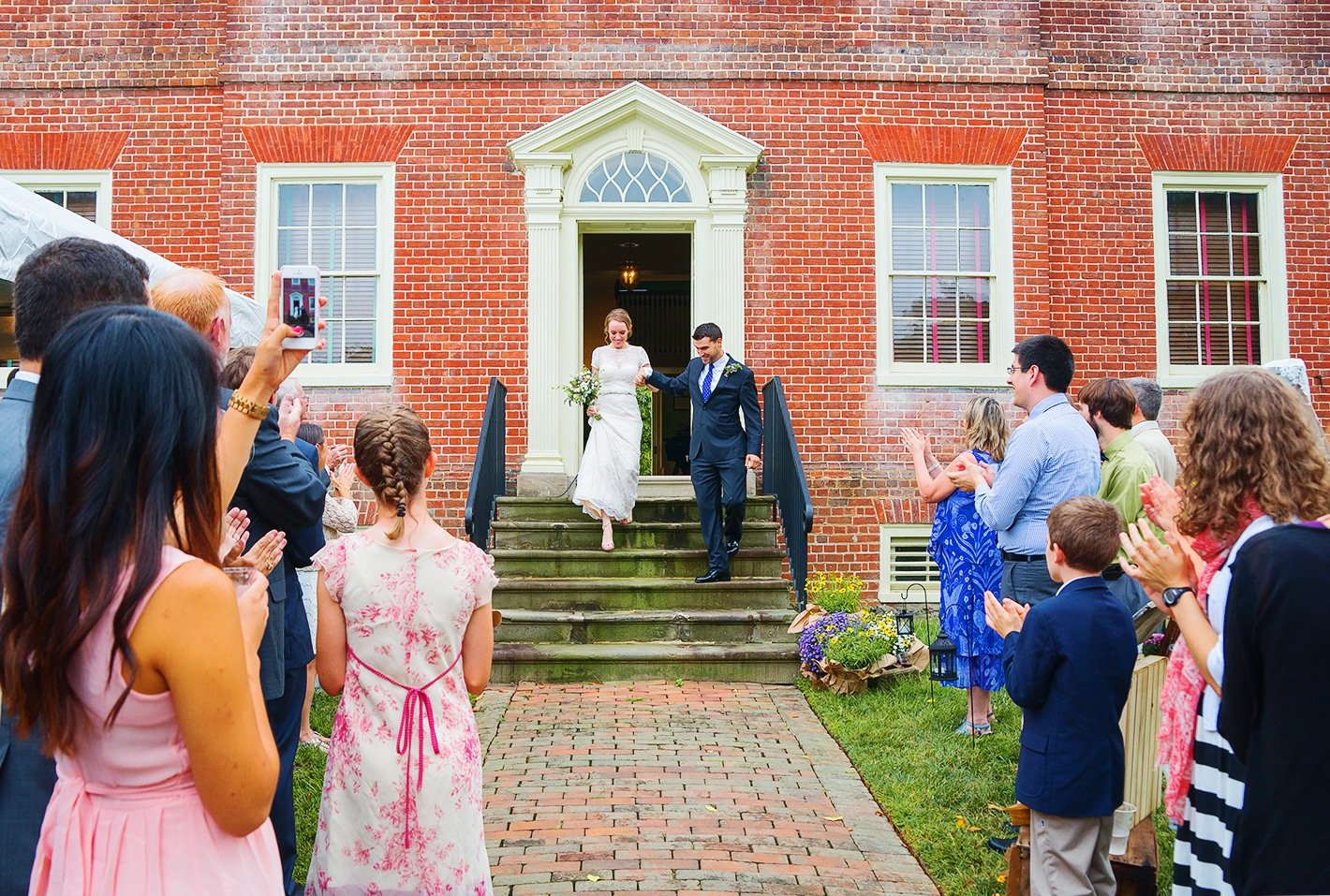 Bride and groom exit photos at montpelier mansion