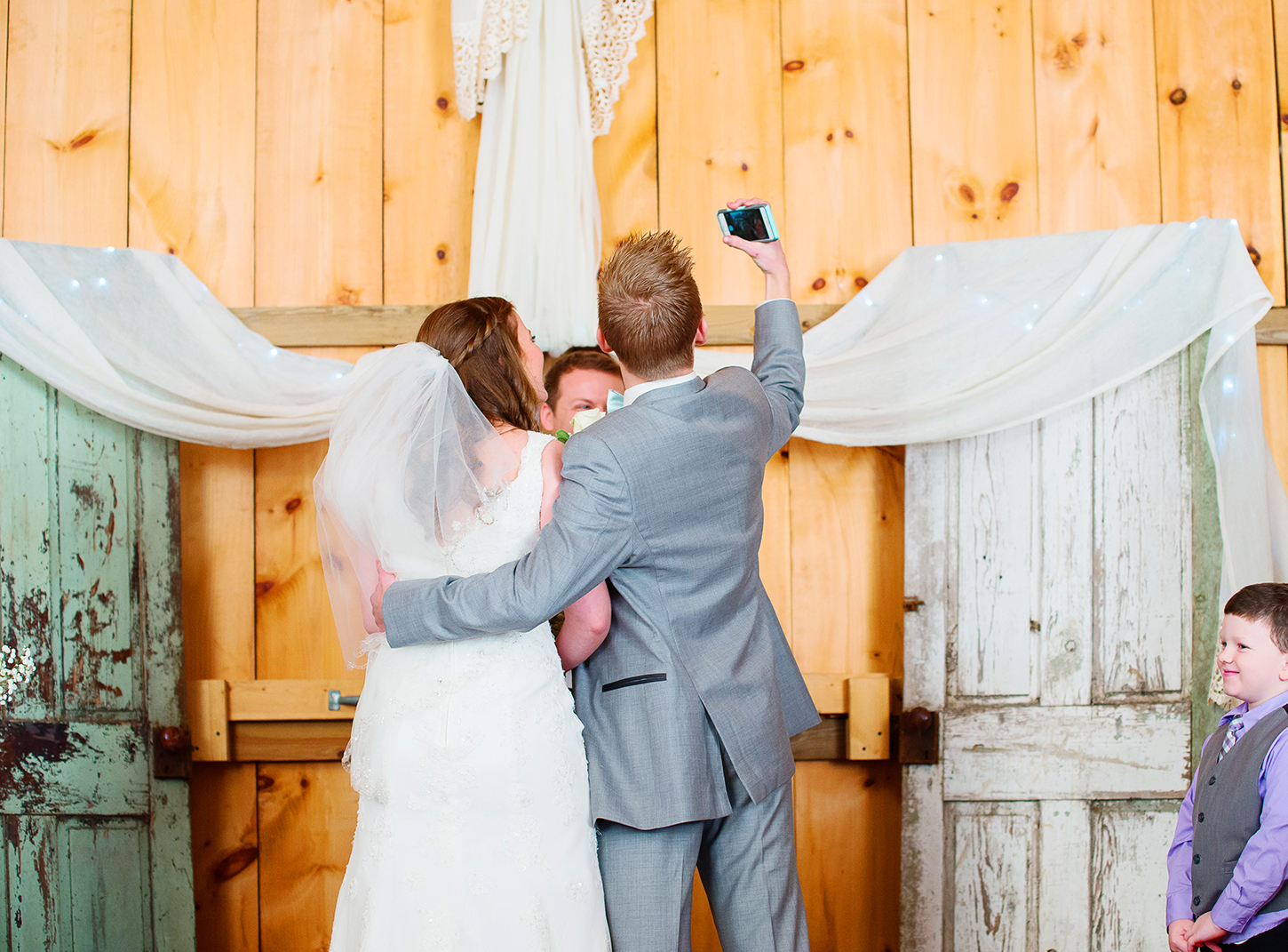 Bride and groom barn wedding ceremony photos