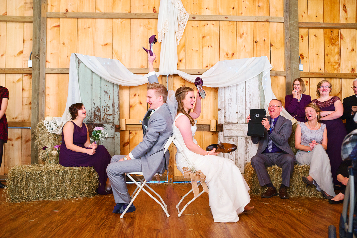 The shoe game at Steppingstone museum barn wedding in winter