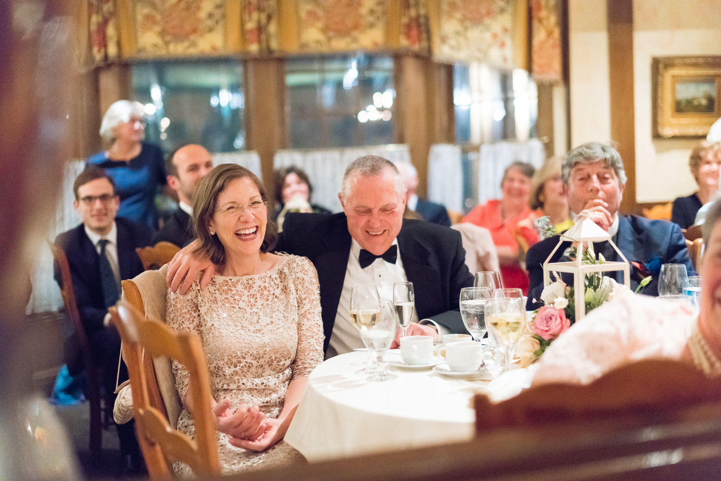 Bride's parents laughing during the toast at La Ferme in bethesda Maryland 