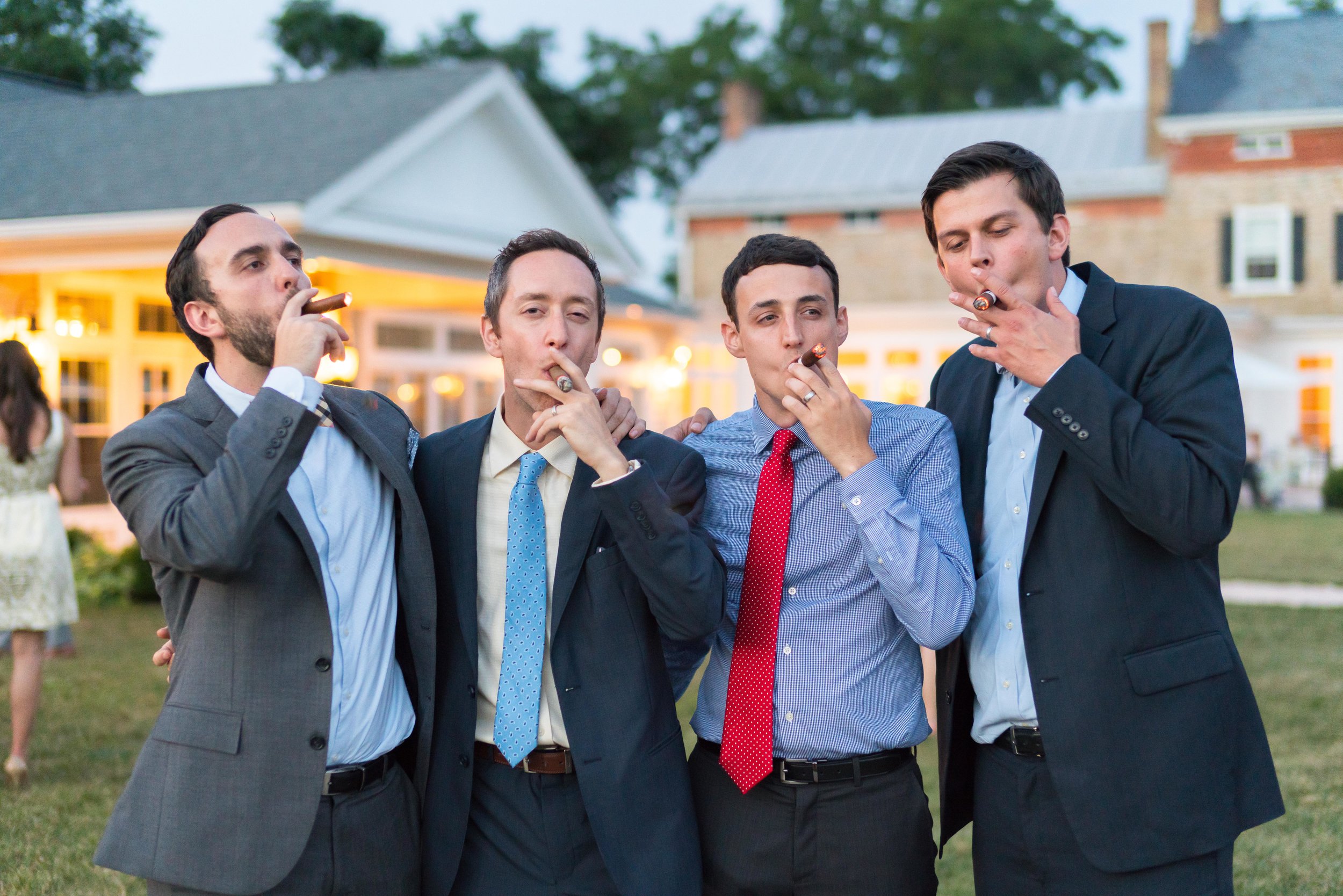Groomsmen photo smoking cigars at Springfield Manor