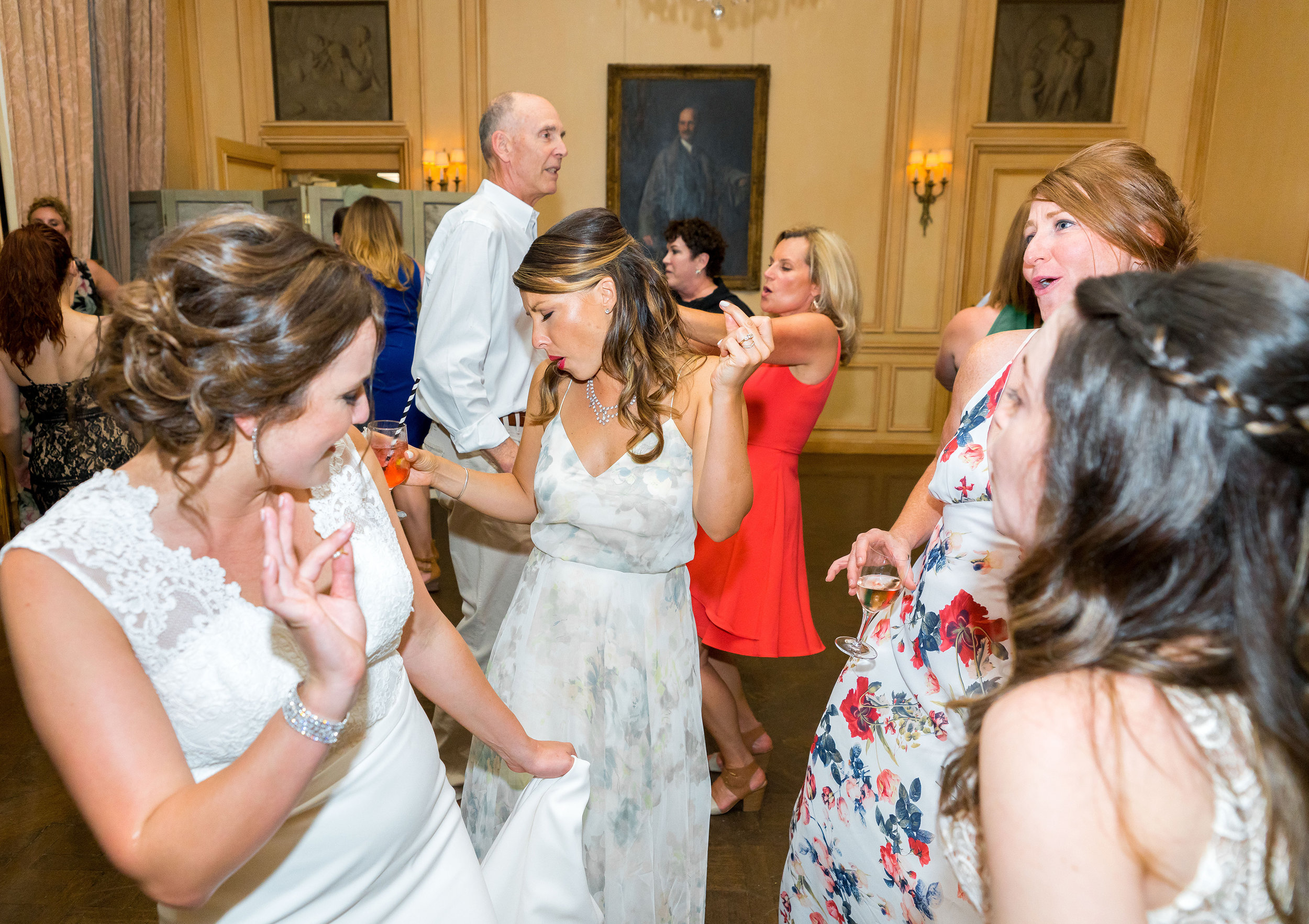 Maid of Honor and bride at wedding reception at Meridian House 