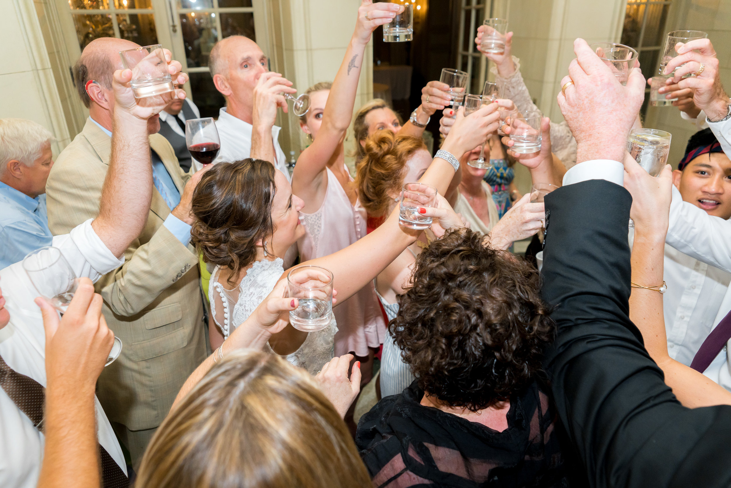 Toasts and shots at a wedding reception at meridian house 