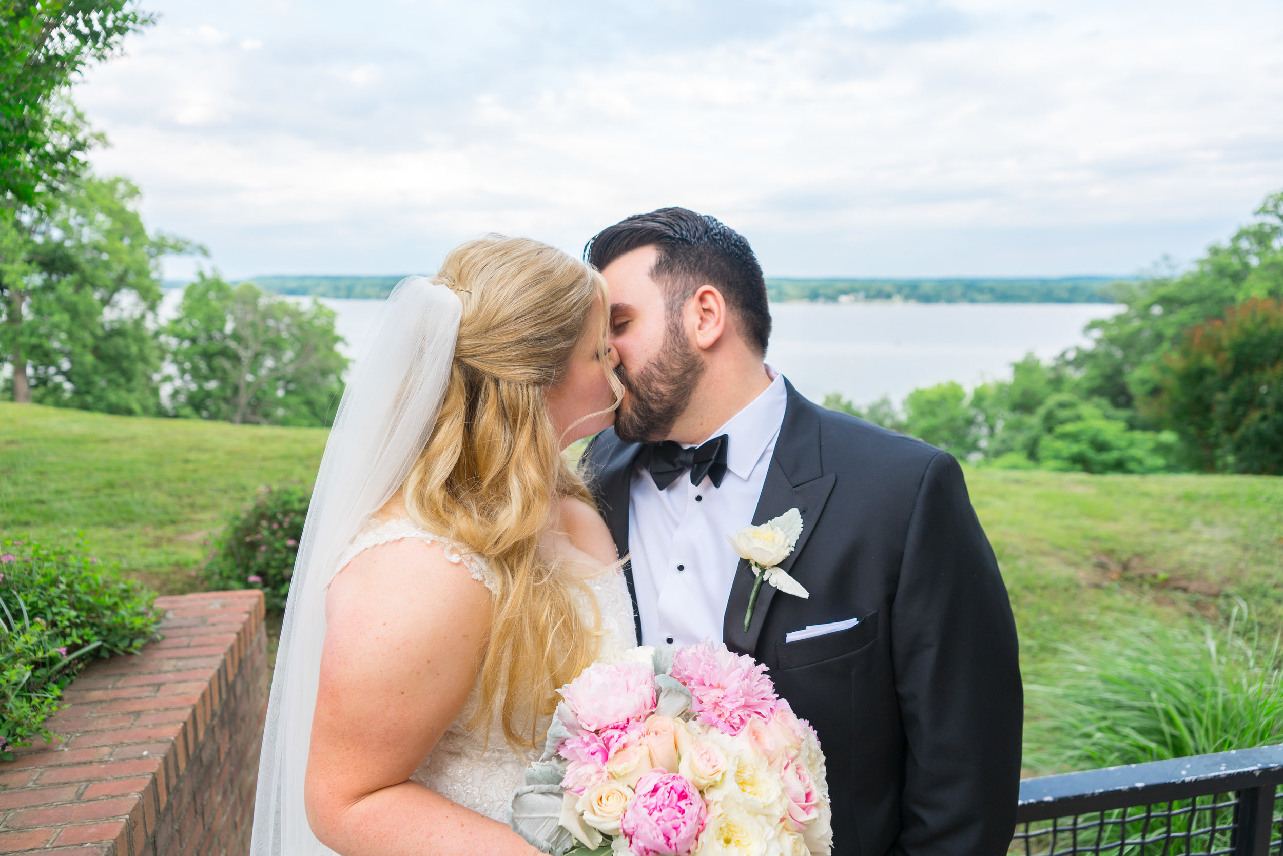 Bride and groom overlooking the potomac river wedding photos