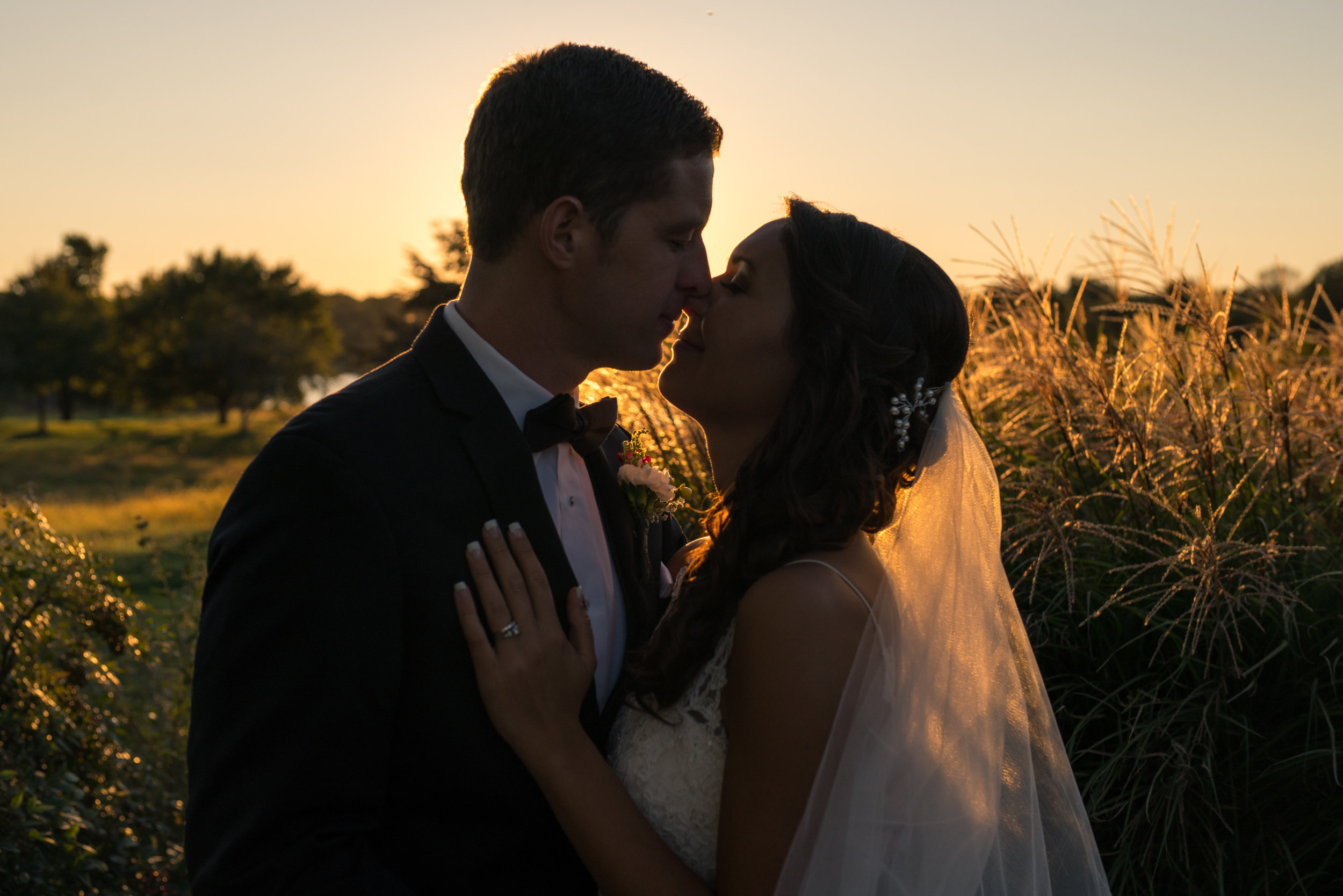 Golden hour sunset wedding photo at Chantilly National Golf Club by Jessica Nazarova