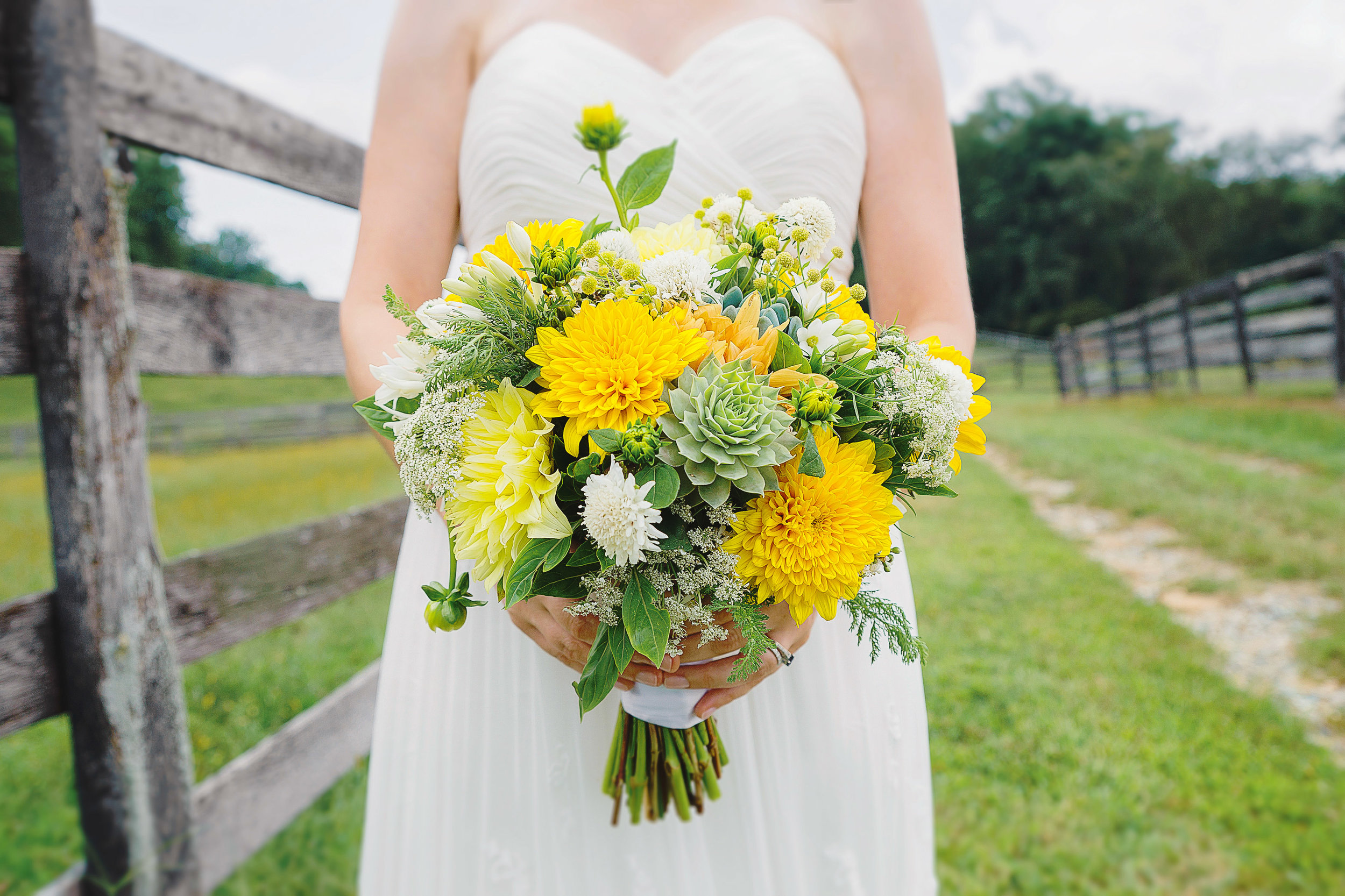 Succulent and yellow floral bouquet at Baltimore wedding by Jessica Nazarova