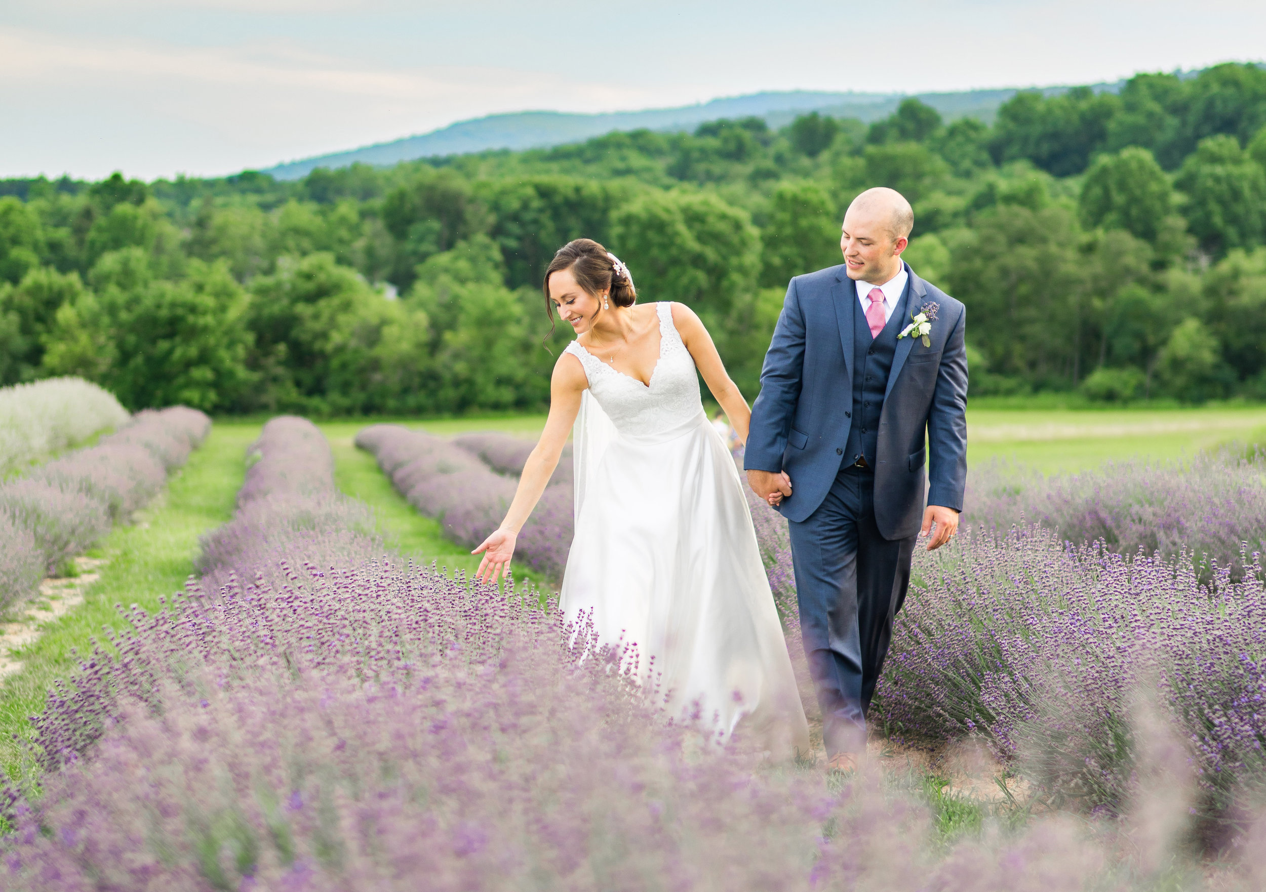 Amazing lavender field wedding photo with bride and groom