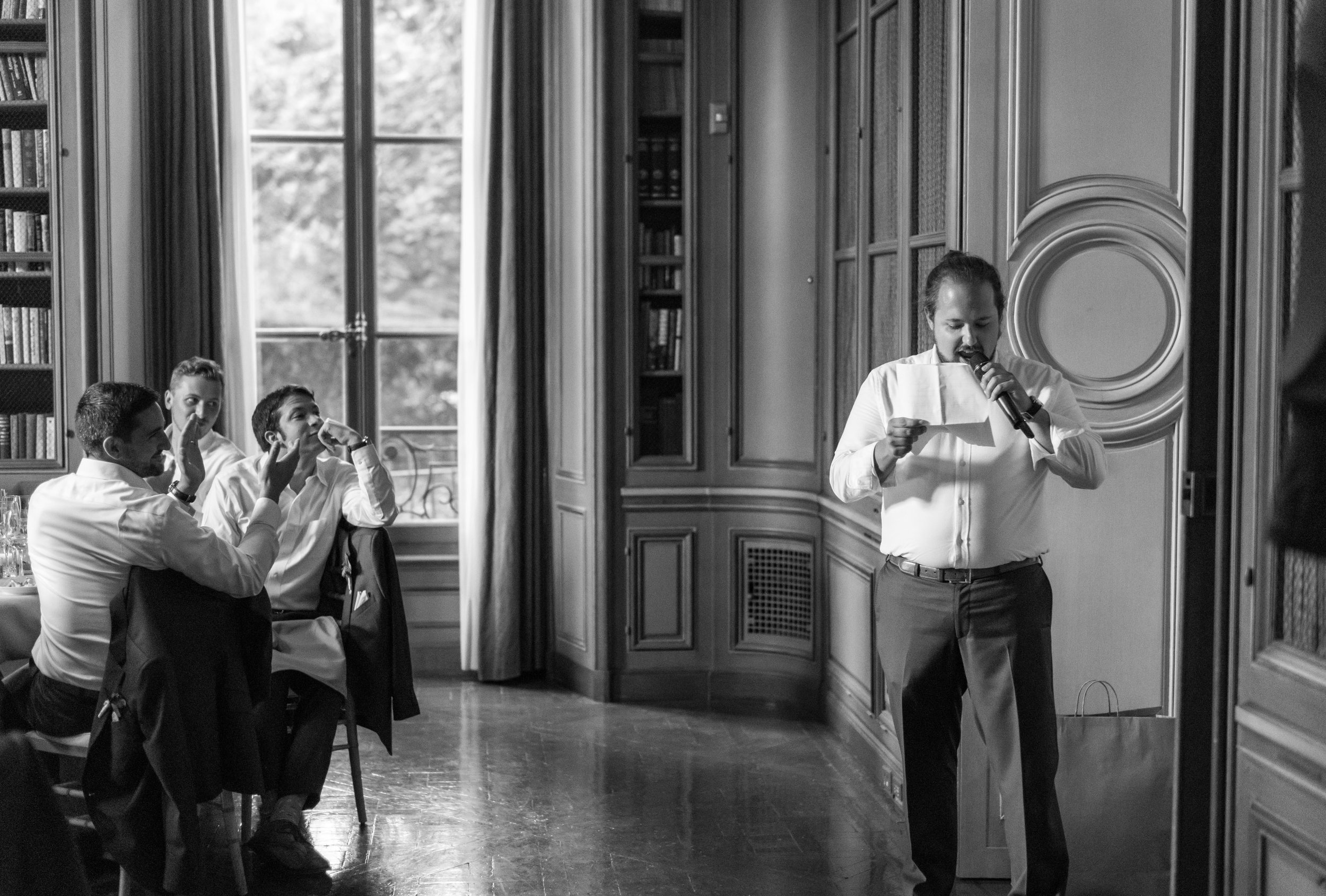 Groomsmen toast in the green library at meridian house wedding