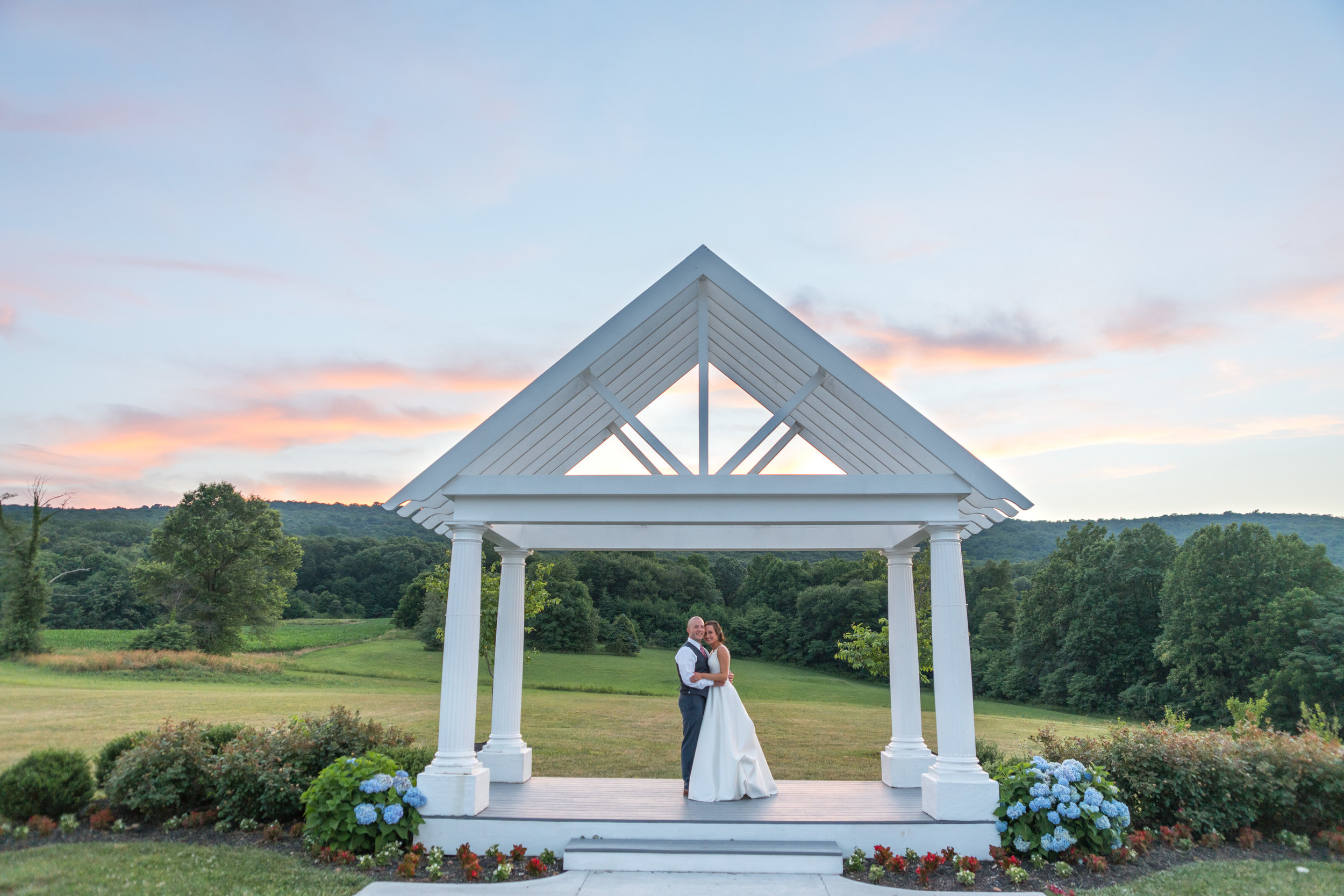 Ceremony spot at sunset at Springfield Manor Winery and lavender by jessica nazarova