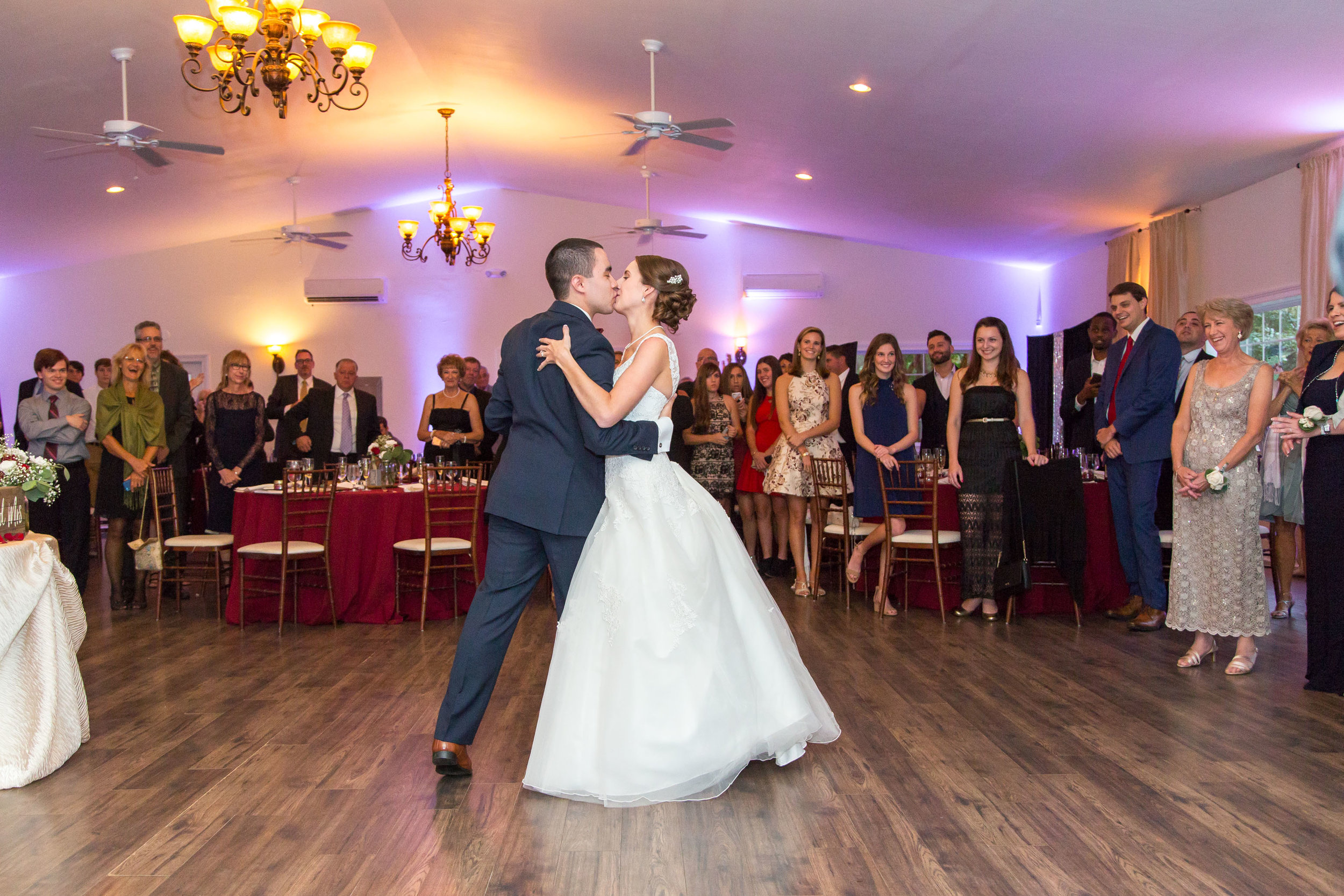 Bride and groom share their first dance at Harvest House