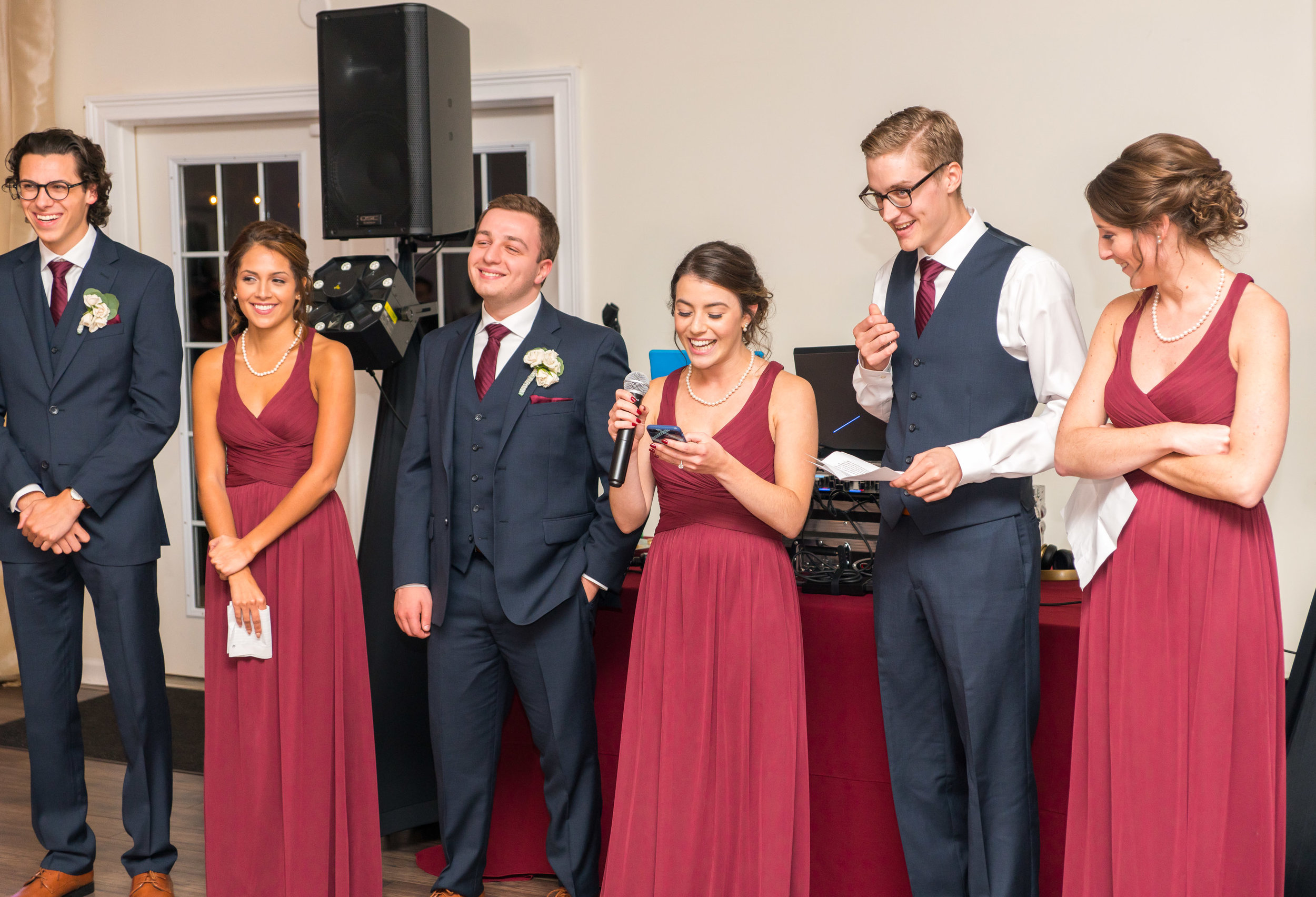 Bridal party reading their toasts Lost Creek Winery